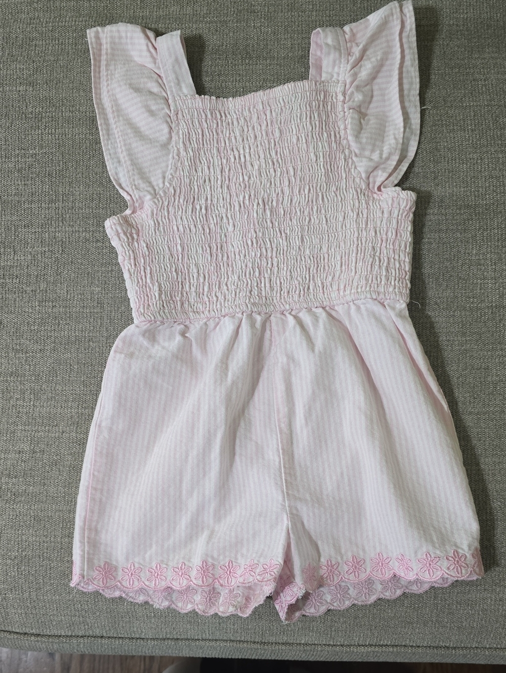 Girls' Light Pink Smocked Romper with Floral Trim